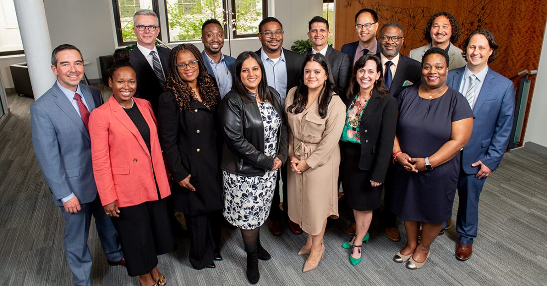 The 2022–24 Child and Family Fellows stand together, smiling at the camera.