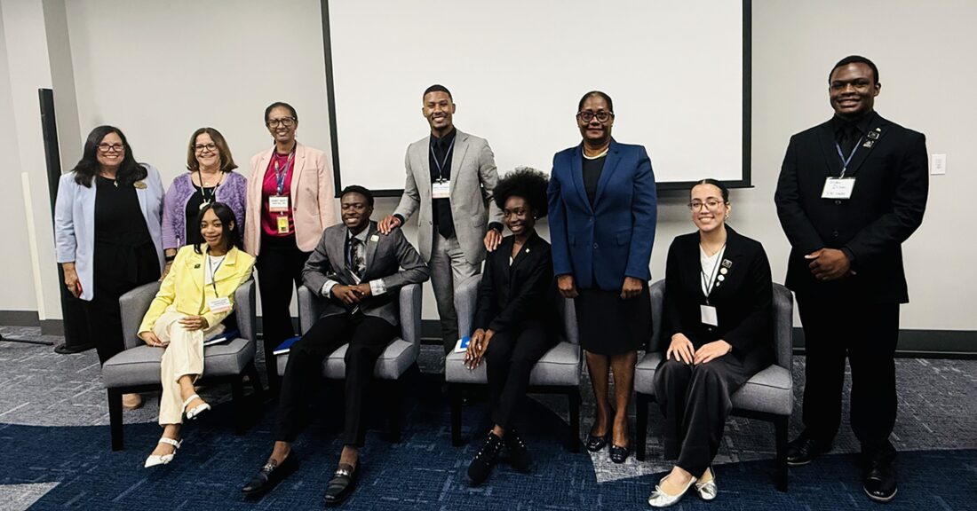 Youth Advisory Council members from the Partnership for Youth Financial Wellness gather for a group photo following an in-person meeting.