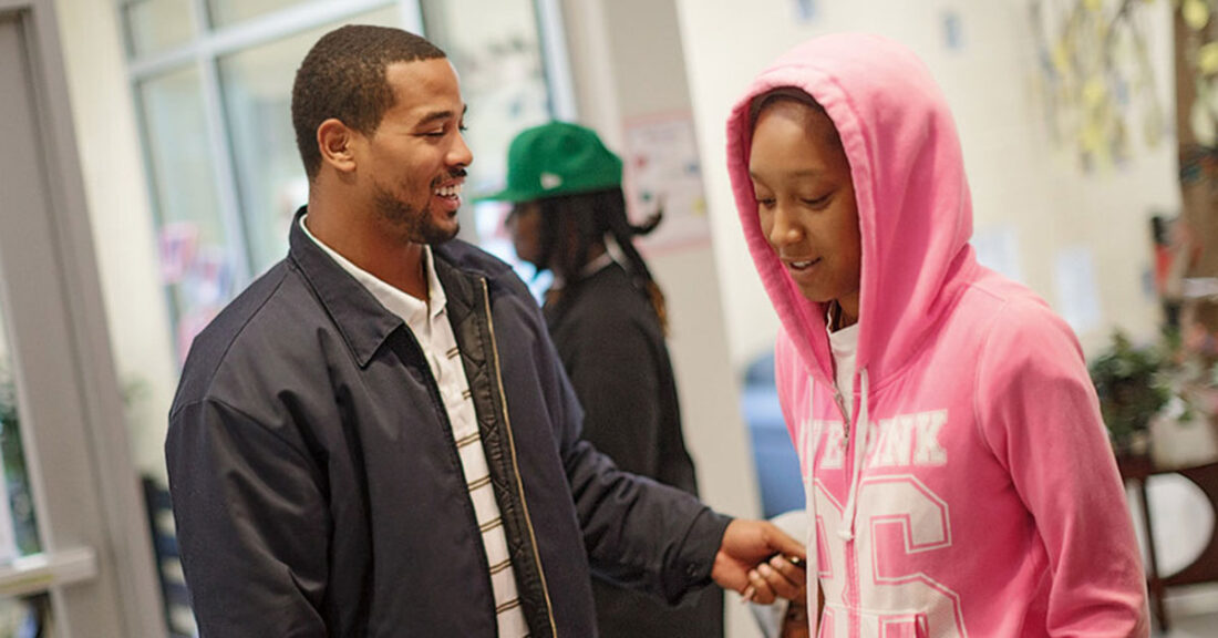 Community member with young person from Atlanta