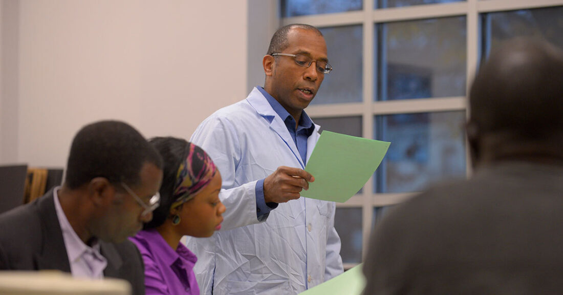 Man talking at a community meeting