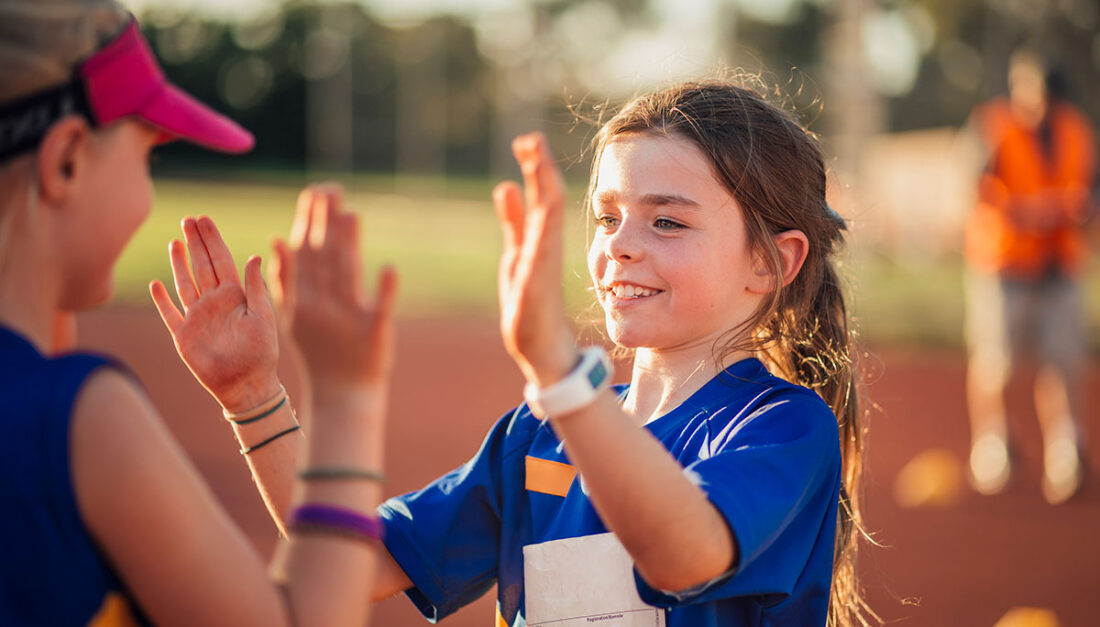 A young girl finds success on the baseball field with her friend.