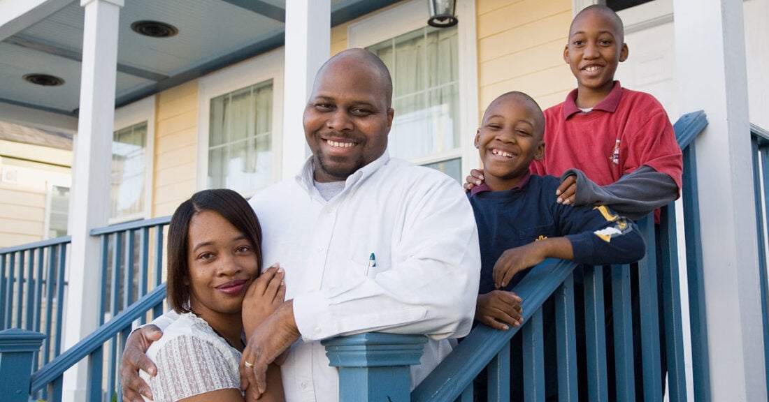 Family on porch of house in Atlanta