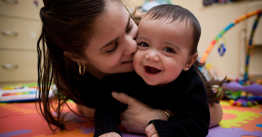 Young parent with infant child