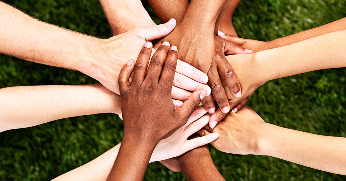 Young people holding hands