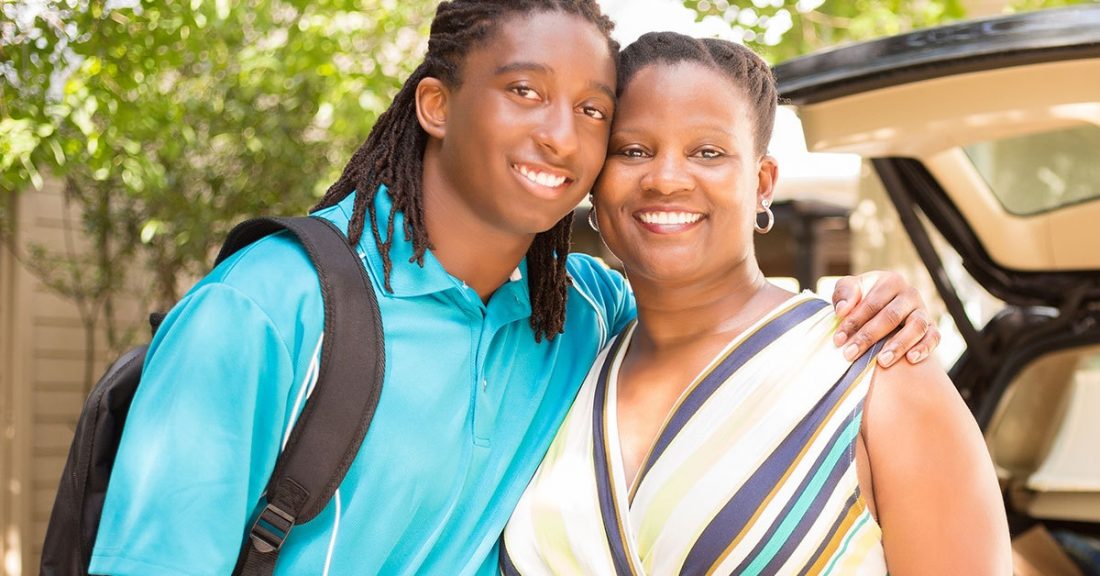 African American teenager with his mother
