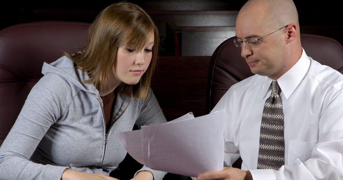 Young person talking with an attorney