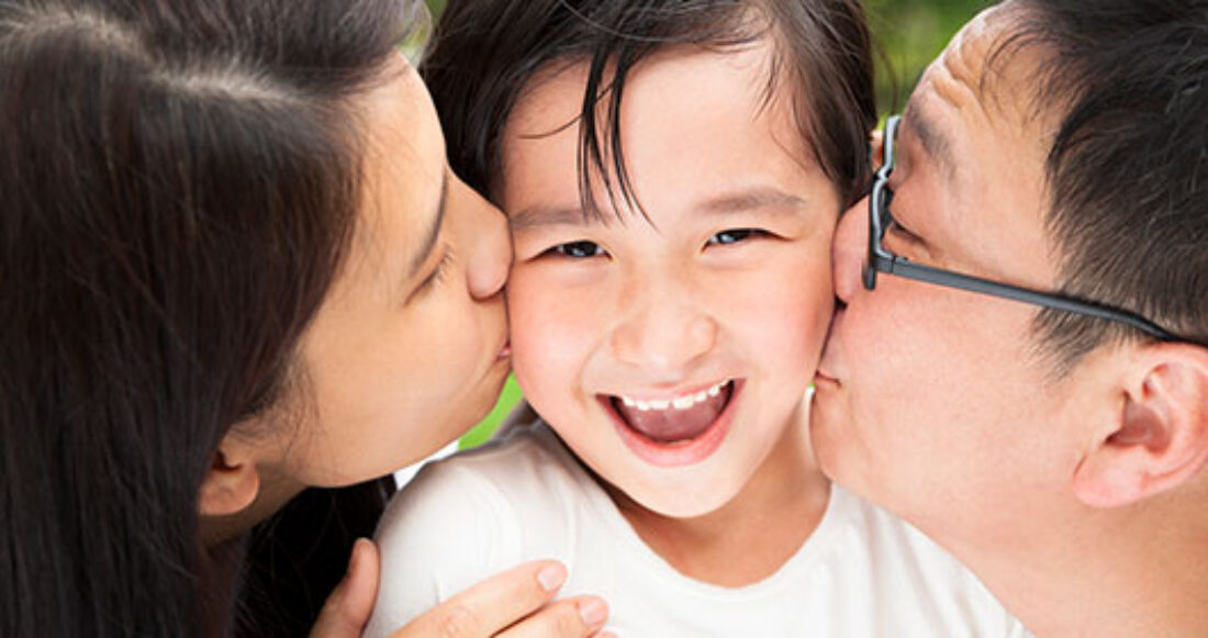 A happy family with a child at the center