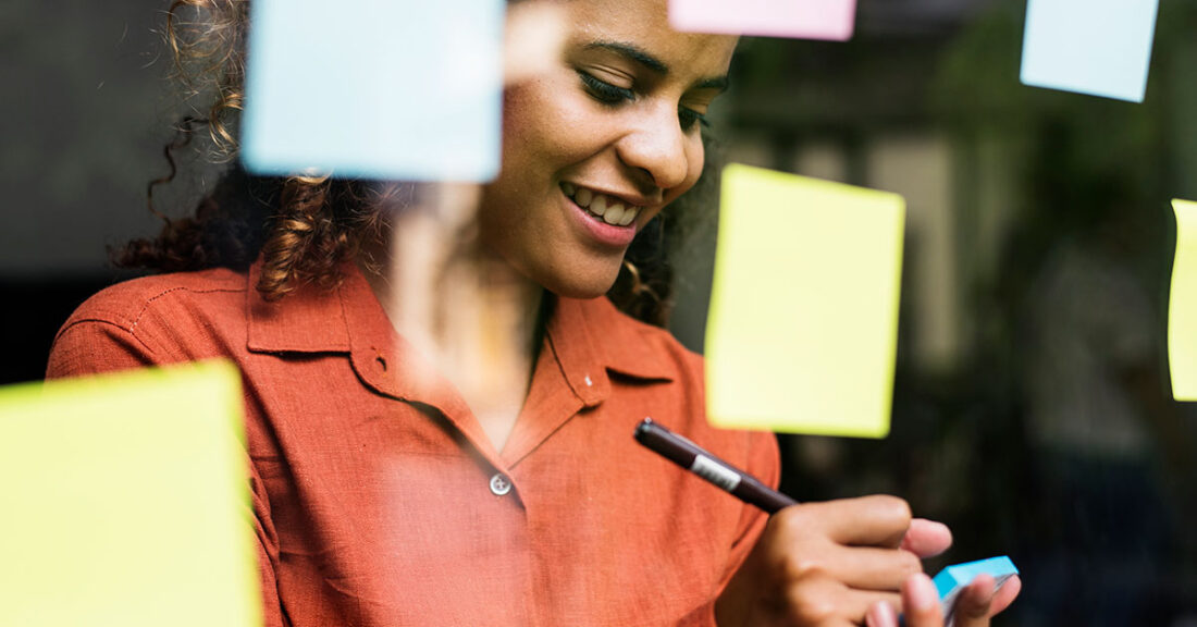 African-American woman generates ideas for her business