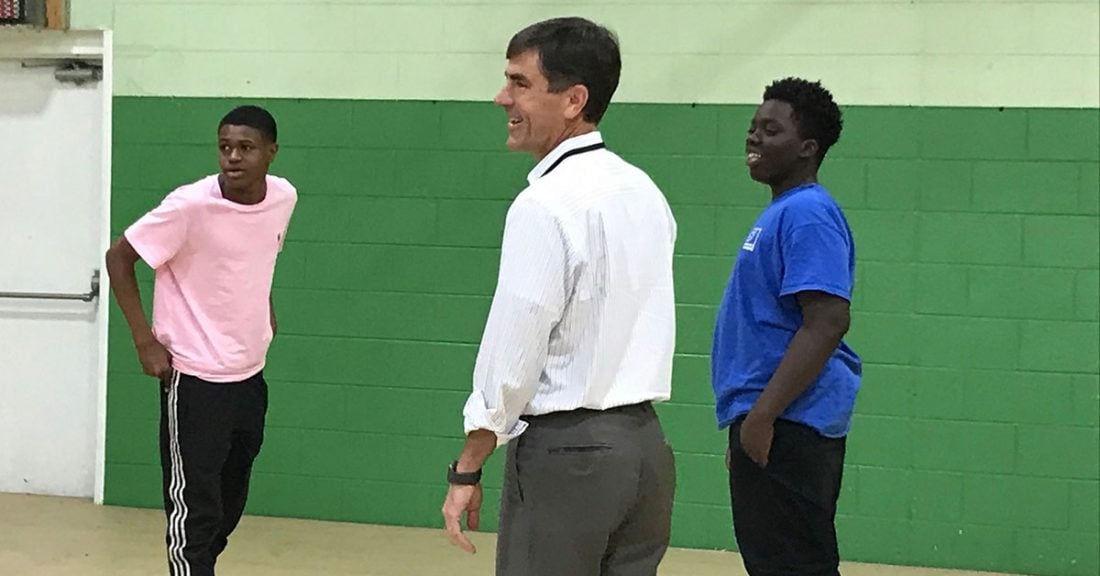 Lawmakers and playing basketball with young people during a tour of Greenbriar Children’s Center in Savannah, Georgia