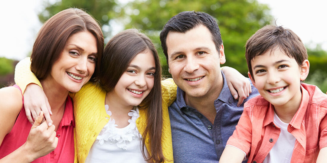 Mom and dad with two adolescent children