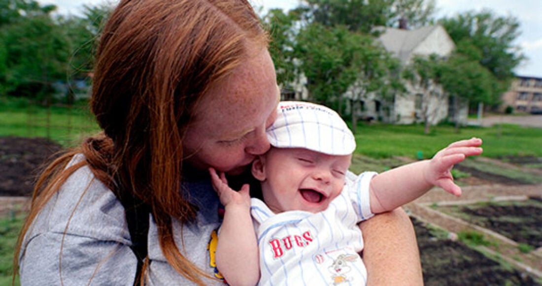 Mom with infant in Des Moines, Iowa.