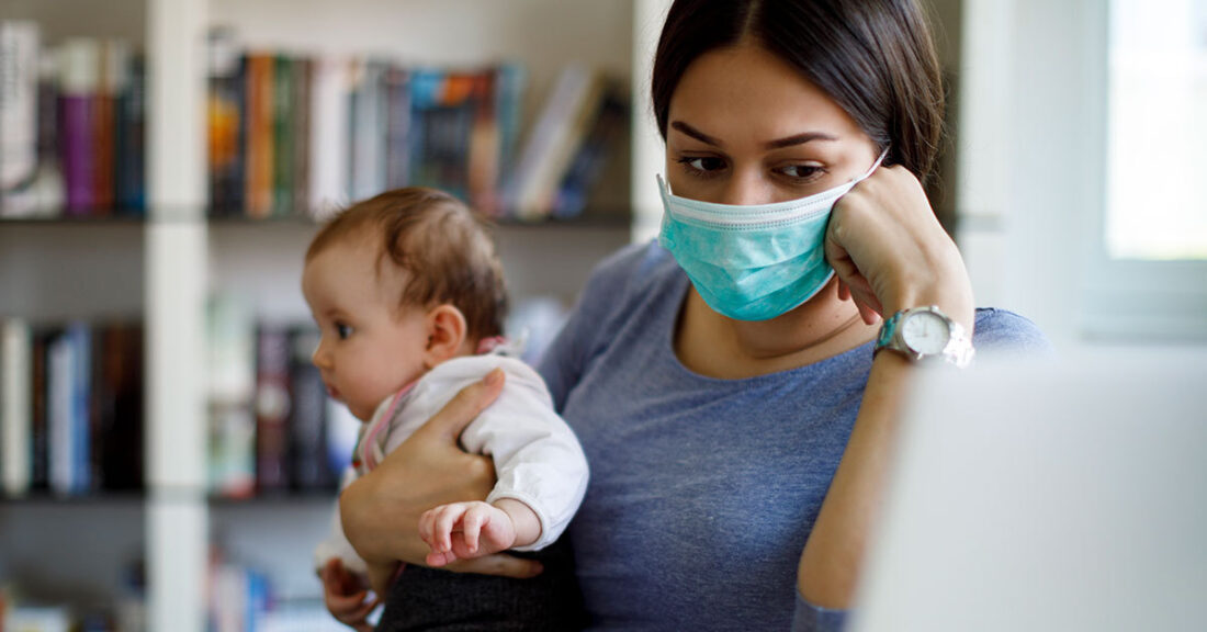 Young parent with child during pandemic